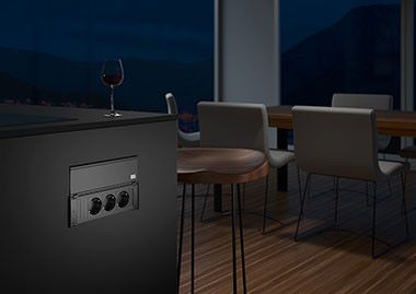 Our connection panels fit perfectly into any setting – even in a colour environment with dark tones