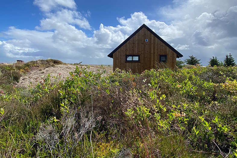 Et arkitektonisk mesterværk med wedi gulvelementer og rustfri riste